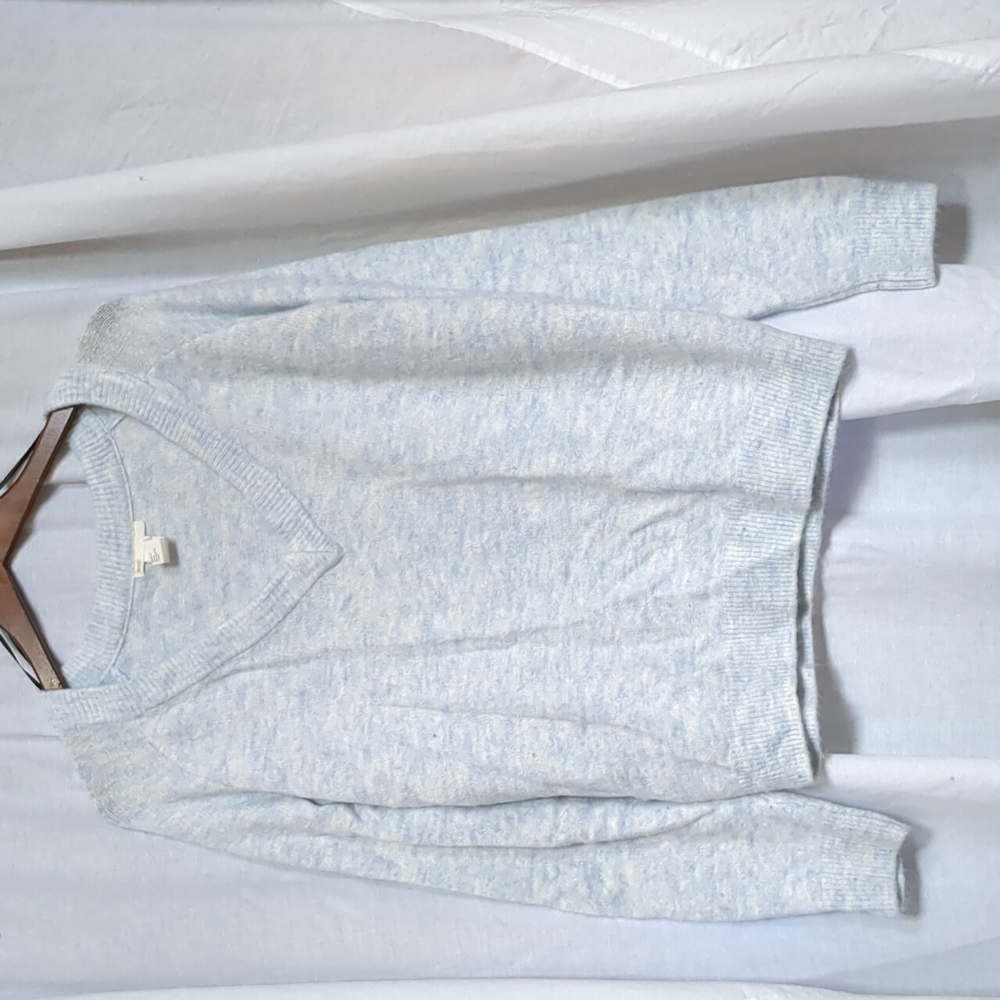 Blue and white speckled v-neck sweater